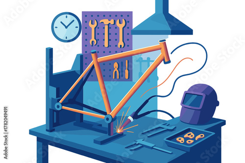 Welding a bicycle frame in a metalworking workshop with tools on a blue workbench