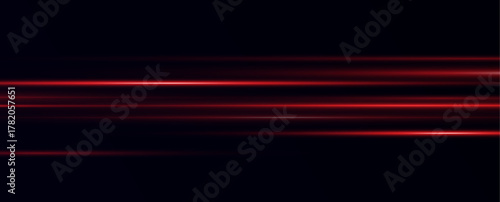 
Horizontal beams of red light on a transparent background. Laser beams.