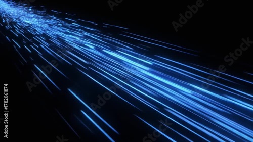 Abstract blue light trails streaking across a dark background