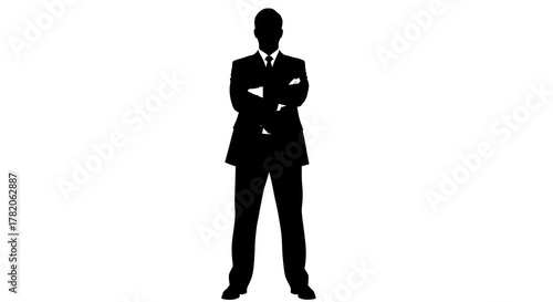 Silhouette of a man in a suit standing with arms crossed against a white background in full view
