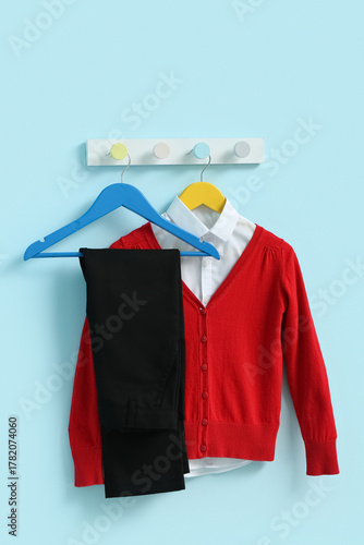 Stylish school uniform hang...