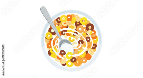 An overhead shot of cereal in a bowl with a spoon