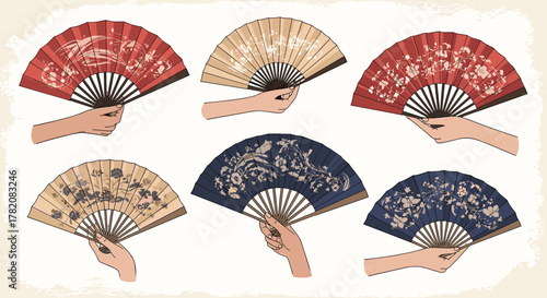 Beautifully decorated traditional hand fans held by elegant hands for a cool summer breeze.