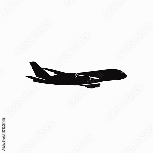 Black silhouette of a commercial passenger jet airplane in flight, isolated on a white background. Modern aircraft travel icon.