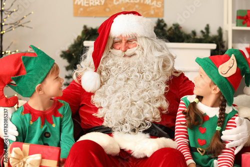 Little elves with Santa Cla...