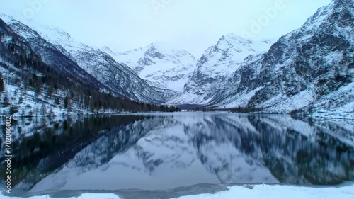 Wallpaper Mural Winter mountain lake reflects peaks and forest. For travel, landscape, tourism, or backgrounds Torontodigital.ca