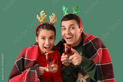 Young couple in reindeer ho...