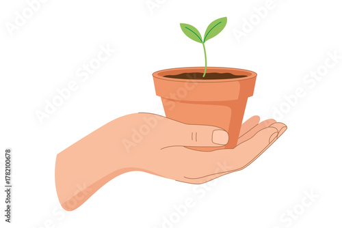 A hand gently cradles a terracotta pot containing a small, growing plant.