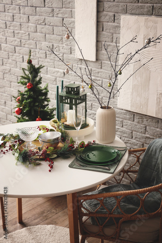 Vase with tree branches and...