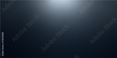 Dark blue metallic background texture with light and brushed steel pattern for a textured silver aluminum wallpaper backdrop