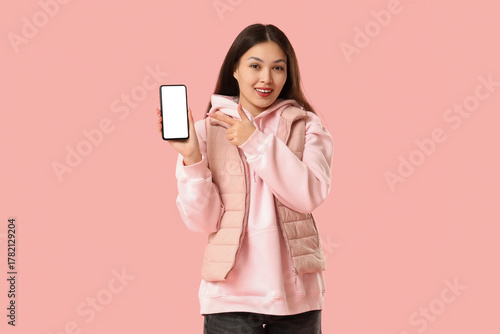Beautiful young Asian woman...