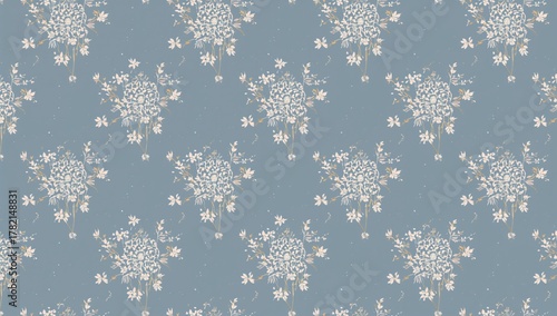 Floral design featuring delicate flowers on a muted blue backdrop, ideal for textile applications