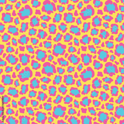 Vibrant leopard motif seamless pattern. Bright animalistic style background design. Fashion vector illustration