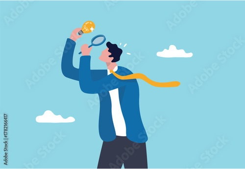 Perfectionist, too much attention to details, high standard goal, focus on perfect result concept, perfectionist businessman with magnifying glass looking at every details of lightbulb idea.