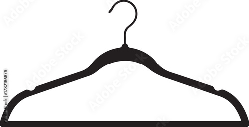 A single black velvet hanger with a curved design and a metal hook isolated on a clean white background showcasing its elegant simplicity for clothing storage