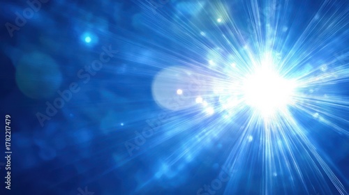Bright, radiant, and energetic burst of light with visible rays and bokeh effect against a deep blue background, symbolizing energy or a star