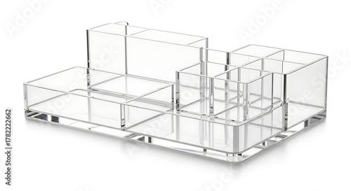 Versatile clear acrylic makeup organizer with multiple compartments for cosmetics, lipstick, and brushes, isolated on a clean white background