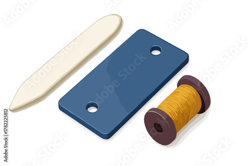 Essential crafting tools bone folder blank blue tag and bright yellow thread spool