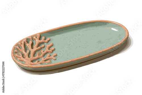 Speckled oval ceramic serving dish featuring an embossed coral relief design