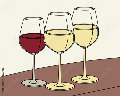 Three wine glasses with red and white wine