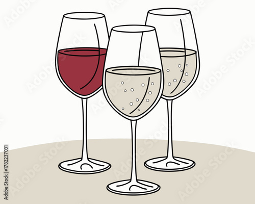 Three wine glasses with red, white, and sparkling wine