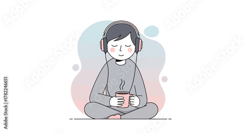 A person sits cross-legged in meditation, wearing headphones and holding a warm cup, embracing a moment of peace and calm
