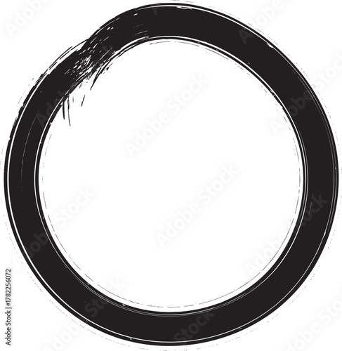 Enso circle drawn with black paint brush, representing enlightenment and zen
