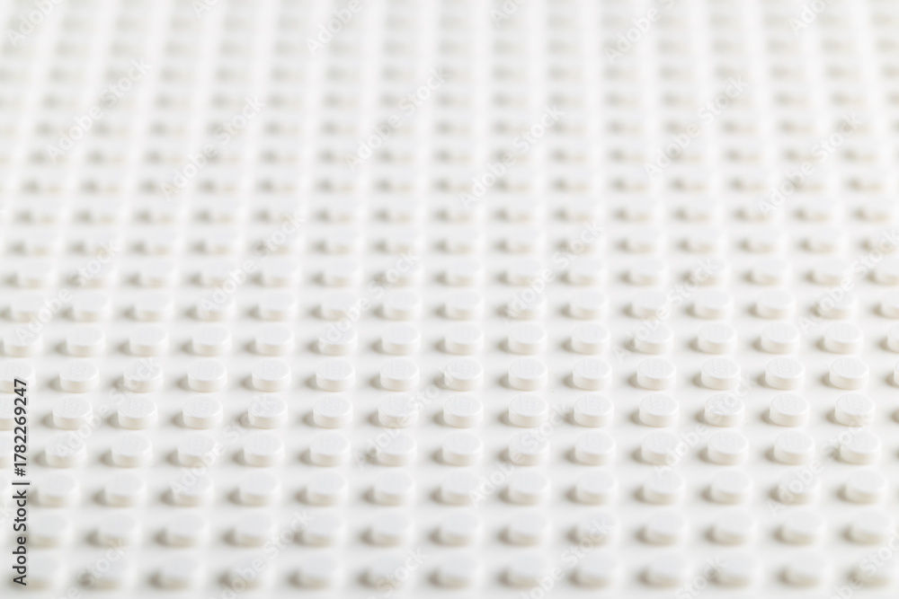 Naklejka premium White LEGO Baseplate Top View Seamless Pattern