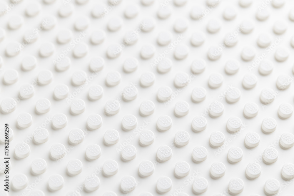 Naklejka premium White LEGO Baseplate Top View Seamless Pattern