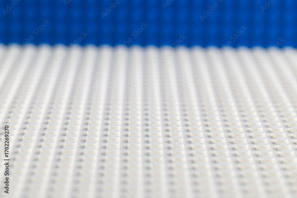 Obraz premium Blue and White LEGO Baseplates Building Background