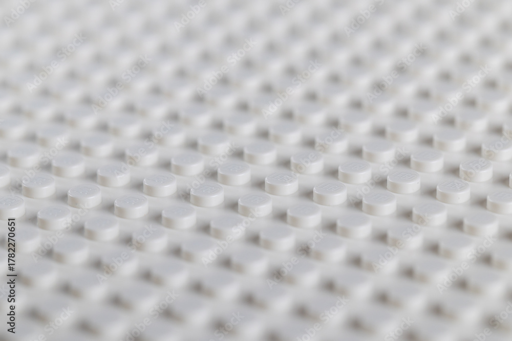 Fototapeta premium White LEGO Baseplate Top View Seamless Pattern