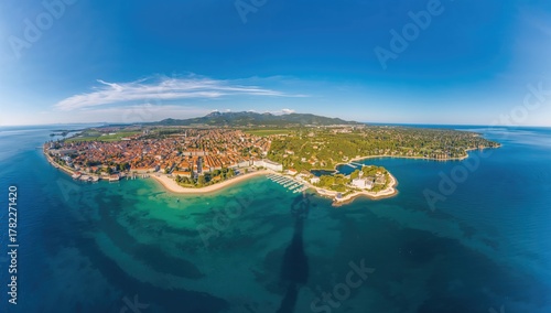 Fototapeta Naklejka Na Ścianę i Meble -  Aerial view of Kvarner Bay featuring Croatian coastal towns, highlighting urban density