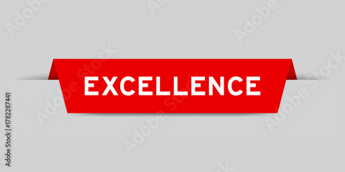 Red color inserted label with word excellence on gray background
