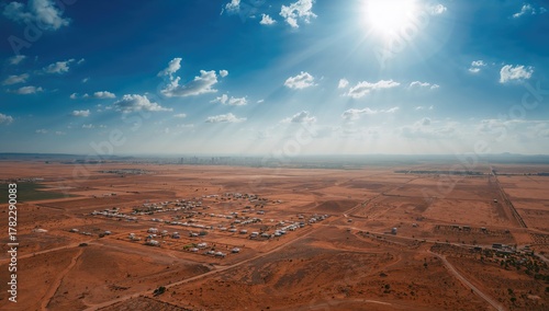 Fototapeta Naklejka Na Ścianę i Meble -  Aerial view of a Bedouin settlement in the Judean Desert, showcasing urban density