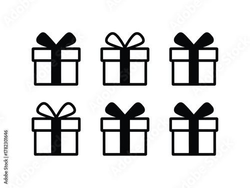 Six simple gift boxes are lined up in two rows with black bows.