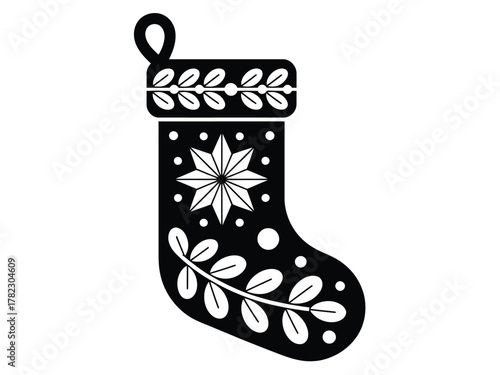 A festive Christmas stocking is decorated with folk art motifs and floral patterns.