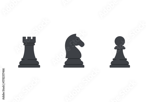Three black chess pieces rook knight and pawn on a white background