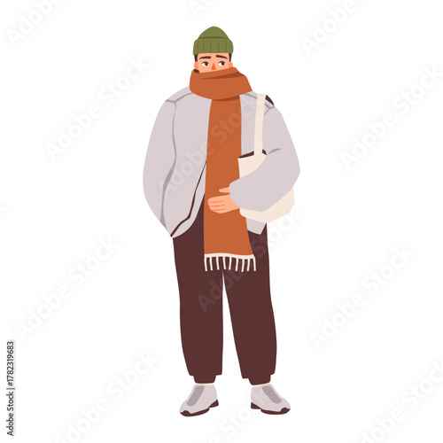 Man in winter clothes with scarf and tote bag. Vector illustration of a man dressed for cold weather wearing a beanie, long scarf, casual jacket.