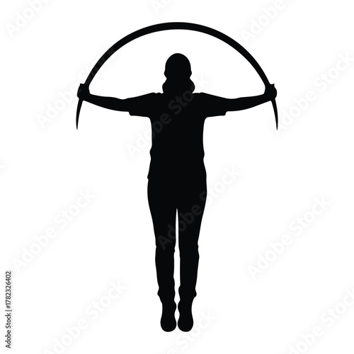 Person holding jump rope in silhouette skipping exercise
