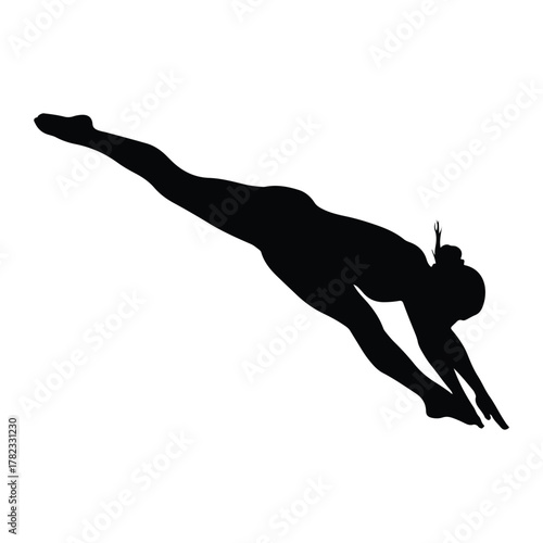 Silhouette of a female diver in mid-air diving swimming