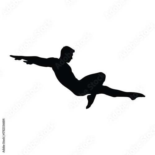 Silhouette of a man in a dynamic acrobatic pose on white background
