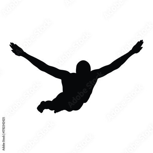 Silhouette of a man skydiving or flying with arms outstretched on white