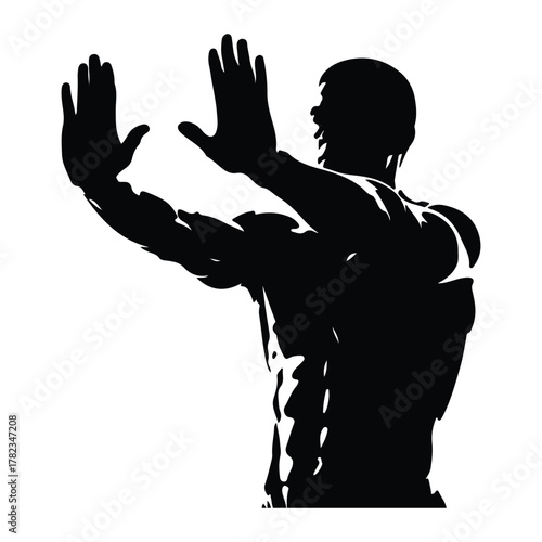 Silhouette of a muscular man with hands raised in defense