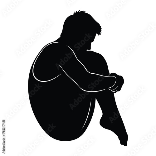 Silhouette of a person curled up in a fetal position