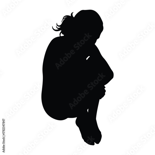 Silhouette of a person curled up in a fetal position
