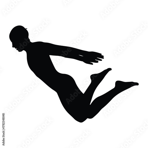 Silhouette of a person diving or falling jumping