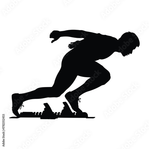 Silhouette of a sprinter in starting blocks race athletics
