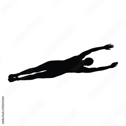 Silhouette of a swimmer in a butterfly stroke swimming