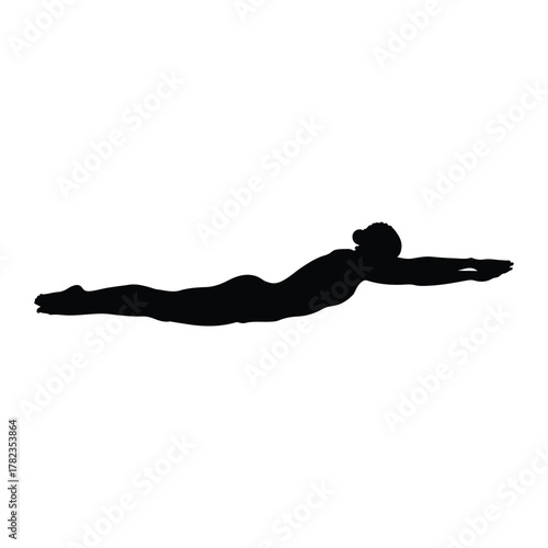 Silhouette of a swimmer in a front crawl stroke swimming