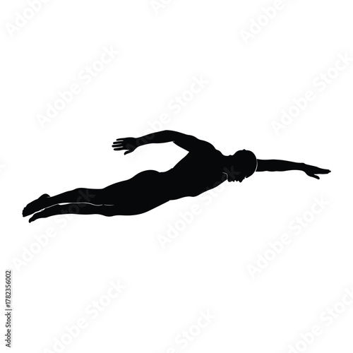 Silhouette of a swimmer in butterfly stroke swimming